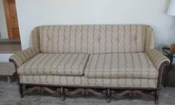 Antique Victorian Sofa Originaly from Watertown's Old Koen's Furniture Store & purchased from the family estate. 6 ft 7" long x 33 1/2 High, (2) cushions w/clips to hold in place, seat measures 5' 7". six buttons across the back, 18" floor to cushions