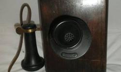 You are viewing a collectable wall phone. I do not know much about this and did not know how to test it. I am selling for a friend. I tried to take as many pictures as possible. The 2 bells at the top worked as I was carrying it. The black part that you