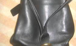 coach bag great condition - can be worn as a purse or a smaller back pack type bag - black leather - gorgeous