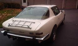 This beautiful Avanti classic is white with a saddle leather interior; Borelli wirewheels from the factory...recarro leather seating with aged patina...huge panaromic sunroof...all original condition inside & out...odometer says 40,000 miles, but not