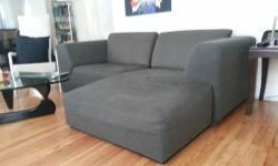 Beautiful modern sofa with chaise for sale. It is in two pieces, and can easily fit into any tight space. We got it specifically because we have small door frames, but it would be a wonderful addition to any apartment, and can fit in any elevator/squeezed