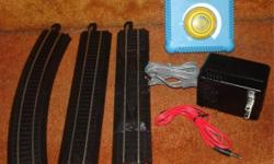 For sale is one (1) complete HO Scale STEEL E-Z TRACK OVAL (Black Roadbed) with Controller and Power Pack from Bachmann.
These track and power supplies are Brand New, never used, with all parts intact.
You will receive:
* 1 - 9" Straight Track; item