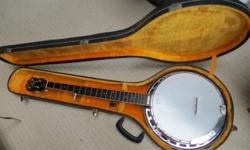 Epiphone Masterbuilt banjo w/resonator and hard case.
In excellent condition & with extra strings! Has been barely used - add it to your household & bring joy to your life!