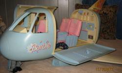 Have hours of fun playing with your Barbie airplane. Side opens up to allow you to put passengers in and feed them from the kitchen area.