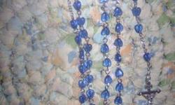 just beautiful. heart shaped Rosary Beads, not sure if they are plastic or glass but the color is splendid, and they are made well - 1 of 2 pairs that i am listing...
please contact me at [email removed]
