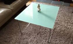 Beautiful Milky Glass and Aluminum Coffee Table purchased at DDC on Madison Avenue.
27 3/4 x 30 1/2 18 high