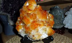 This is a Beautiful Huge Dark, Golden Brown Citrine Crystal Cluster. It has a wide base and can be displayed without a stand. It is a much higher quality than most pieces and has been a part of my private collection for many years. I know it will be the