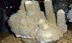 Calcite Huge Finger Calcite-This Beautiful Gallery Specimen comes from Mina Pistosa, Bernejillo Durango Mexico. On the surface of this Huge Specimen as tiny crystals thru ? out, the color- light brown ? beige. The most Beautiful Treasures are made by