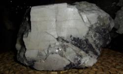 Beautiful Huge Kunzite with Black Tourmaline Crystal Rough from Zimbabwe Southern Africa. Ready for display. Metaphysical Properties of Kunzite. Kunzite Crystal is a high vibration stone that can encourage the energy of love to fill your life. These