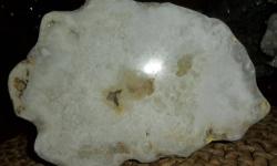 This Beautiful Kentucky Geode comes from Boyle County, Kentucky. The color of this beautiful 2 tone Crystal White. This Geode is Unique and Perfect with Perfection. Triple AAA Grade. Measurements: Almost 8? Wide, Around 6? Tall and 3 3/4? Thick. Weight: 7