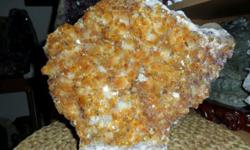This is a Beautiful Museum Quality Huge Dark, Golden Brown Citrine Geode Cluster Section. It has a wide base and can be displayed without a stand. It is a much higher Gem Quality than most pieces and has been a part of my private collection for many