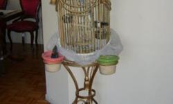 Sell a Beautiful 4 Parakeet with vintage cage. Parakeet are colored green, blue and purple. Pickup only. For more information, please call (646) 669-4809.