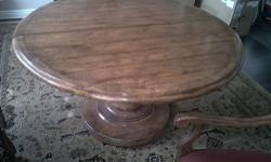 Beautiful, like new Ralph Lauren Collection Mahogany wood Dining Table for Sale. Barely used and in mint condition. Would be the perfect classic addition to any dining room. Seats 8-10 comfortably with leaves. Dimensions: 60" in diameter with two