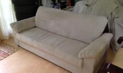 This Beige, microfiber suede couch is only 2 years old and has been virtually in storage, barely used by my family as it did not match our current room. Bought for 300, the price is negotiable. Professionally cleaned and ready for a new home! supremely