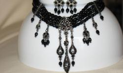 ? New with tags/Never worn
? Bought Set for $250, Art Deco style "Ben-Amun" Choker Necklace + Earrings.
? Made from vintage Black Glass Beads in Silver-Plated Pewter Deco style setting.
? Choker measures 12" at shortest close and 15" at longest close.
?
