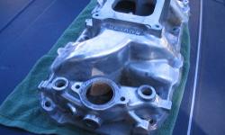 This big block Chevy manifold was manufactured by Weiand and is polished. It needs a little cleaning up and repolishing. That's what happens when you leave them sitting around for about 10 years in your garage. Price is $75.00 for a quick sale.