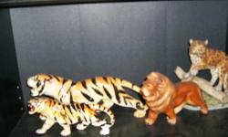 10 VARIOUS figurines, tigers, leopards and lions. few bought in antique shop. 7 prints of lepoards and lions , one is a huge 30x40 inches in a huge framed glass format. sold where is no delviery , holley area.price is as low as it is going to get.