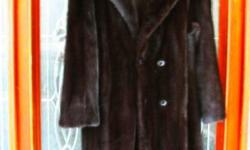 BEAUTIFUL FULL LENGTH BLACK MINK COAT
Black and Beautiful, 54 inches long, custom made black mink coat used less than a dozen times over the last eight year and kept in cold storage for most of the time at between 50 and 60 degrees.
Elegant, stunning and