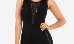 Black lightweight dress with lace underarm, center front, and zips closed with concealed back zipper and one hook and eye closure. . Decorative zipper on front left goes from the waist down to a triangle cut slit. Material: 54% Cotton/ 4% Nylon/ 6%