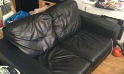 We are selling a black faux-leather couch - 2 years old. It's in wonderful condition. It folds down easily into a sofa bed. It is around 83.5" long, seat depth is 22.5," so the bed is around double this, seat height is 14" and total height is 30.5".
Email