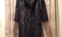 Full length black mink coat in excellent condition. Worn only a handful of times. Comes with matching head piece and removable belt. Fits sizes 6-10.
*Surprise that special someone with this beautiful gift!
Furrier says that a hidden zipper can be added