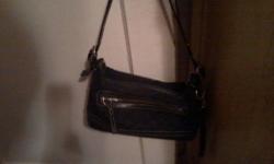 Selling a Real Coach Black Shoulder bag with C on the bag. Material Bag. Very Clean inside. Excellent Condition. Comes from a smoke free house. More Photos Upon Request.
E-mail me if interested with Your Full Name and Phone Number so i can return your