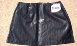 New and Never Worn Skirt - Juniors Size 7
Black with Design & Texture
2 Darts in Front & 2 Darts in Back
Back Zipper
Length of Skirt from Waist to Bottom Hem is Approx 14"
Front: 100% PVC
Back: 100% Polyester
Wipe Soiled Areas Clean