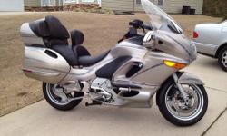 1999 bmw k1200lt-c with 57k miles in excellent cond. am/fm 6 disc cd/tape with sirius sat radio. Heated seats & handgrips. power winsdhield.hwy pegs. intercom system. alarm system with remotes.led ground lights. strobing brake & headlights. reverse gear.