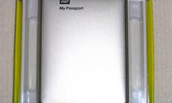 Western Digital My Passport 1TB Portable Hard Drive, USB 3.0, SILVER
http://www.amazon.com/Passport-Portable-External-Drive-Storage/dp/B006Y5UV4A
Brand New, In packaging, never used/opened. If you can find this silver one cheaper else where, I might match