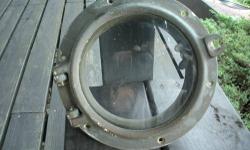 Antique solid brass port hole , 10' across. Needs polishing. Lights are wired and in nice condition.