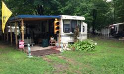 I am putting my camp up for sale that I have at Brennan Beach which is located in Pulaski. It's a 1990 Summit park model that is 37' long. It has one slide out. It has a gas furnace, water heater and cook stove. It has a rooftop ac unit which works really