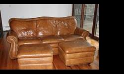 Sleek and modern, this DEEP and COMFY Leather couch is great for movie watching or hanging out. Eager to sell!