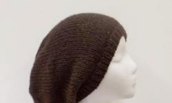 This brown slouch hat colors are shades of dark brown and medium brown. Completely hand knitted. Worn by men and women. The slouch hat is made with a soft acrylic yarn. (Note: this yarn manufacturer calls its yarn colors are inspired by the natural beauty