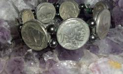 American Buffalo Nickel Indian Bracelet has 7 coins in Front and has 7 inside Bracelet. Coins are Authentic and Dates in Front of Bracelet are 1934-P, 1935-P, 1936-P and 1937-P. and the inside dates are 1937-P, 1936-P and 1935-P. The coins are very nice