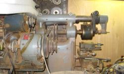 Smaller milling machine, probably weighing between 300 and 500 pounds. Fits on relatively small area.
Variety of Horzontal cutters included.
3 phase motor has been mofified to become a multi-step pulley powered byn a standard 110 volt motor. Motor starter