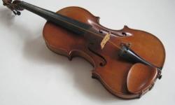 Unique violin has rich sound. Good for solo artist or fiddle player or collector.
Label says 1921 Carlo Micelli but is probably German-made.
No cracks.
Have new strings but no time yet to restring the instrument and take a new picture!