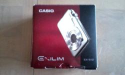 Casio Exilim EX-S12 digital camera / 12MP / 3X optical Zoom / 2.7 LCD / silver / in box with all attachments in wrapping / carry case. Used once. Thanks Charlie (cdbl317 aol)