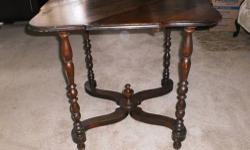 CHARMING SMALL Antique Gate-leg Drop-leaf Table
28" x 28" WIDE when fully opened. ( 36 1/2" long when closed) 27" HIGH
WHEN Fully OPEN: 28" x 28"
WITH THE GATES CLOSED: 36.5 " WIDE
SOUND CONDITION- Has not been refinished, to my knowledge.
ONE SCRATCH on