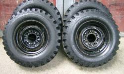I have 4 Hercules HDT tires. Tire size - 9.50 - 16.5 LT M/S.
They are mounted and balanced on Chevy 8 bolt rims. May fit Chevy, GMC, Ford, Dodge 3/4 ton - 1 ton.
All of the tires hold air and have 15/32nds of tread. They are amazing in the mud and the