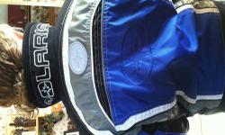Blue, white and black Polaris Child's snowmobile coat, size 10-12
CKX Child's Large Helmet (matches coat)