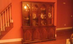 I have for sale a china cabinet 76.5" high, 50" wide, 16" deep. Condition like new. Raised panel glass, light inside.