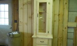 GUN CABINET,HAND CRAFTED, MADE OF EASTERN WHITE PINE, HOLDS SEVEN GUNS, 28" WIDE, 17"DEEP, 83" HIGH HAS ONE DRAWER AND ONE LOWER DOOR FOR STORAGE. CAN EASILY BE CONVERTED INTO A CHINA CABINET. CALL 518-392-2756
