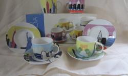 Beautiful hand decorated porcelain demitasse espresso coffee cup & saucer set. Never used. Still in original packaging.