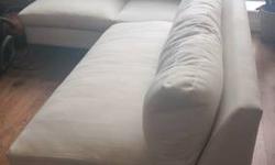 1 year old CB2 Cielo 3 piece sectional in ivory. Great condition. Includes corner chair, loveseat, and single chair (all armless). Scotch-guarded.