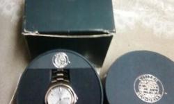 THIS MAN'S WATCH IS BRAND NEW STILL IN BOX AND NEVER WORN. STAINLESS STEEL AND NEVER NEEDS A BATTERY. A REAL MUST SEE. ASKING 25O.00. FOR MORE INFO. PLEASE CALL OR TEXT 585-250-2190