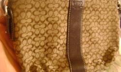 Genuine Coach Hand Bag with Coach Insignia and trademark and Coach numbers embossed inside the bag - bag is clean inside, great bag, great price
**Best way to contact me is through email [email removed]