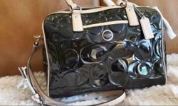 New - never used
Black patent leather signature bag
Beige leather trim and straps
Size: 12 x 8 1/2 x 4 1/2
Includes Shipping