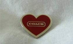 INCLUDES:
1 "COACH" Heart Push Pin
FEATURES:
This beautiful pin is perfect for a scarf, handbag, hat, shoal, blouse or anything your would like to accent. It makes for a great gift with the gift box & COACH tissue wrapping also included. It is a polished