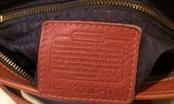 Beautiful Coach purse with serial # and tag. Costs over $200 retail. This won't last.