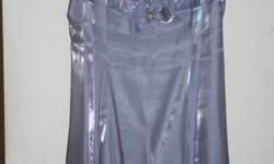 Satin spaghetti strap dress in shimmery pale blue. Size 6. Hardly worn. Great condition. Great for prom or evening out. If interested call 917-576-9798.